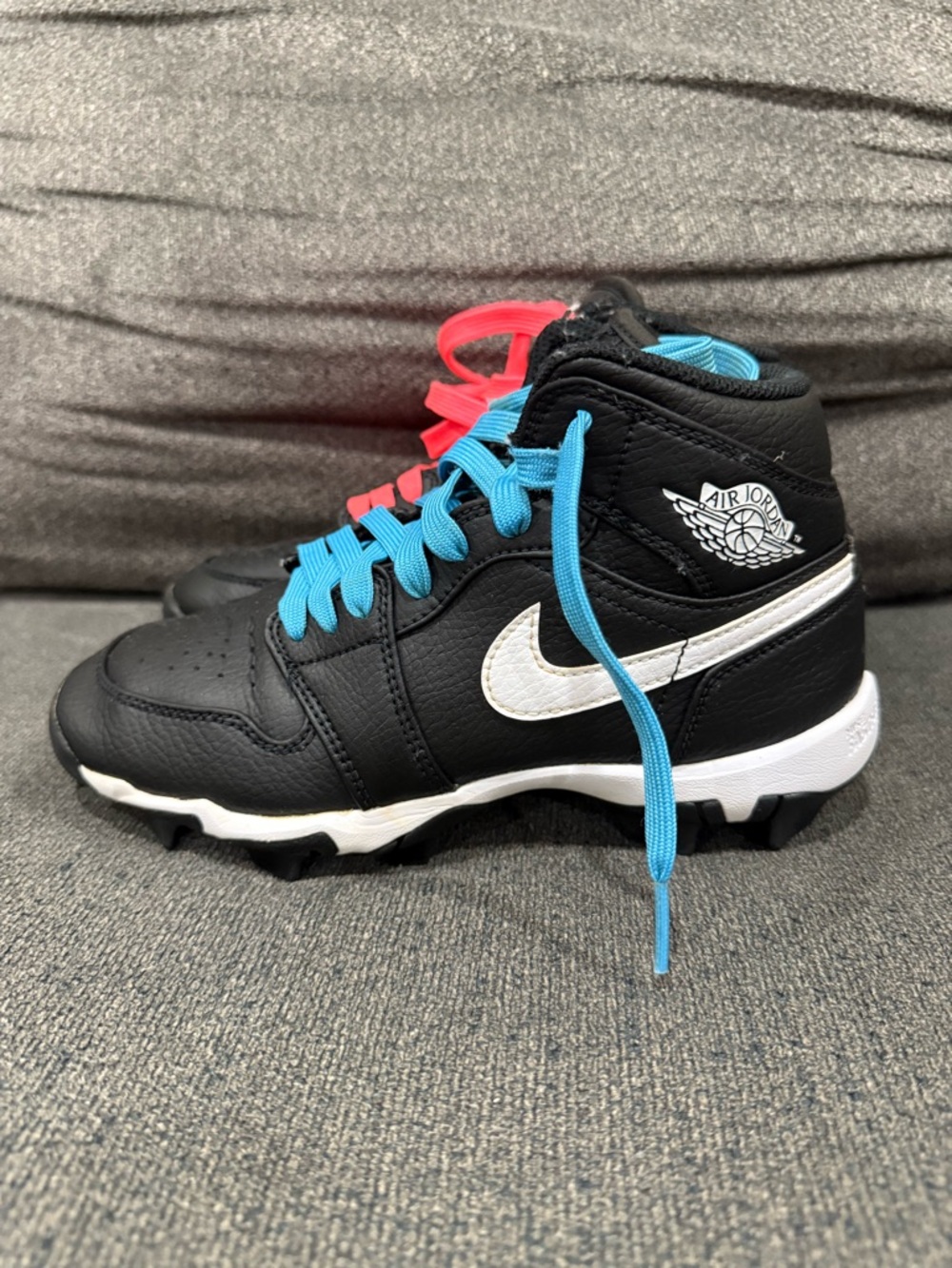 Nike Kids Black High-Top Cleats with White Swoosh and Blue & Pink Laces